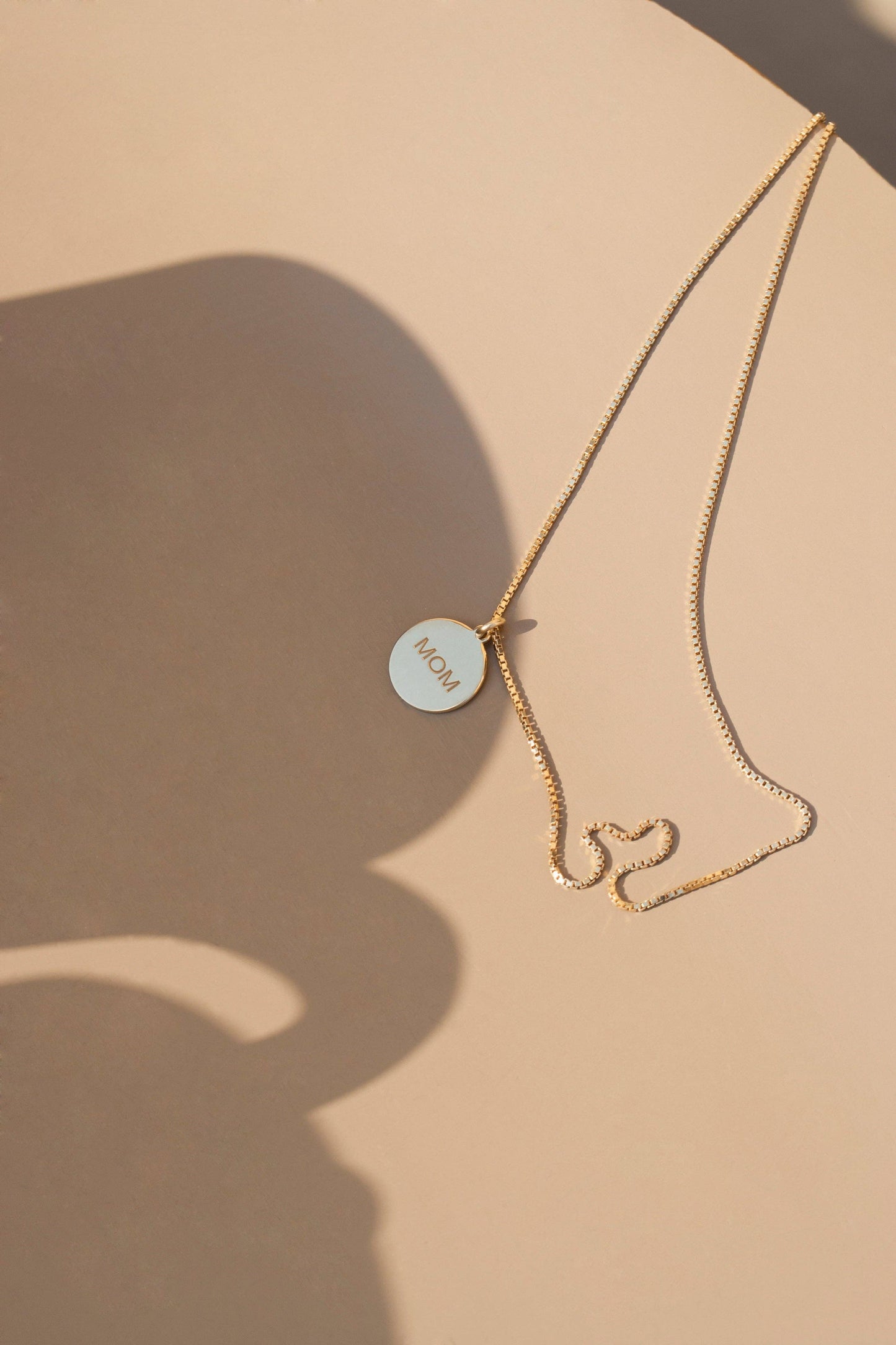 Jukserei MOM-Halskette